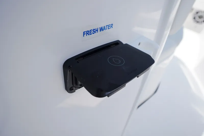 Slide: The Image of Fresh water access on 2027 Tidewater 256 LXF boat, featuring sleek design. - 45