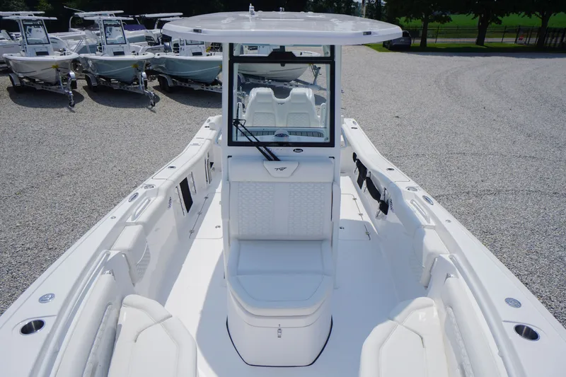 Slide: The Image of 2027 Tidewater 256 LXF boat with spacious deck and modern design. - 17