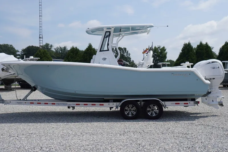 The Image of 2027 Tidewater 256 LXF boat on trailer in outdoor showroom. - 0