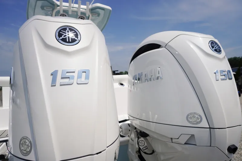 Slide: The Image of Twin Yamaha 150 outboard engines on a 2027 Tidewater 256 LXF boat. - 75
