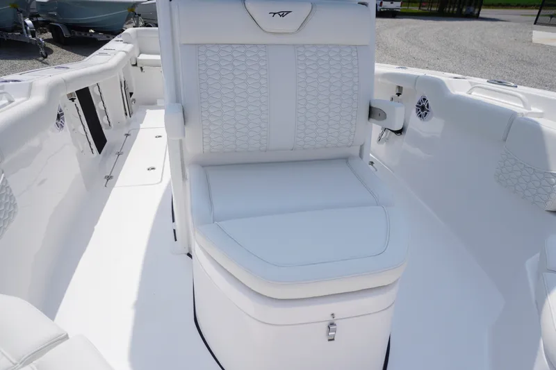 Slide: The Image of 2027 Tidewater 256 LXF boat interior with luxurious white seating and modern design. - 16