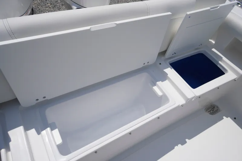 Slide: The Image of 2027 Tidewater 256 LXF boat storage compartments, open and ready for use. - 60