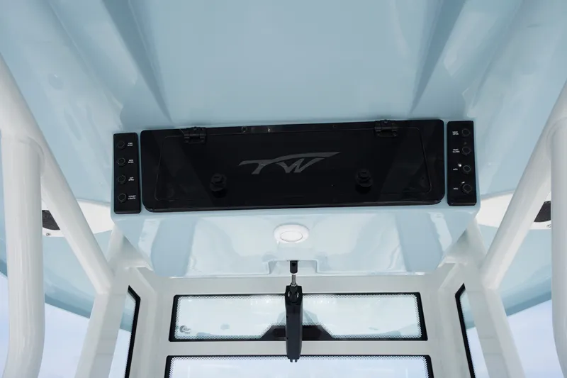 Slide: The Image of Interior view of 2027 Tidewater 256 LXF boat console with control panel. - 43