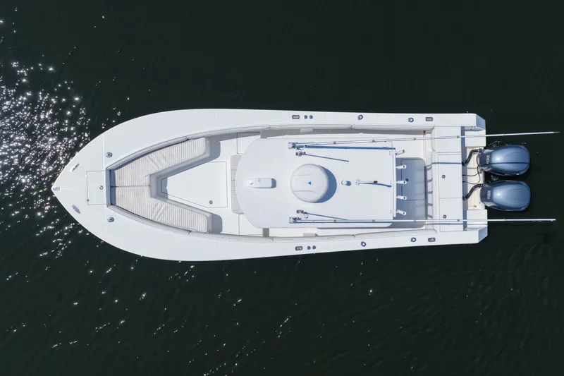 Slide: The Image of Aerial view of 2007 Regulator 29 Forward Seating boat on water. - 36