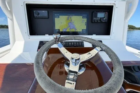 Slide: The Image of 2007 Regulator 29 Forward Seating boat dashboard with GPS navigation system. - 58