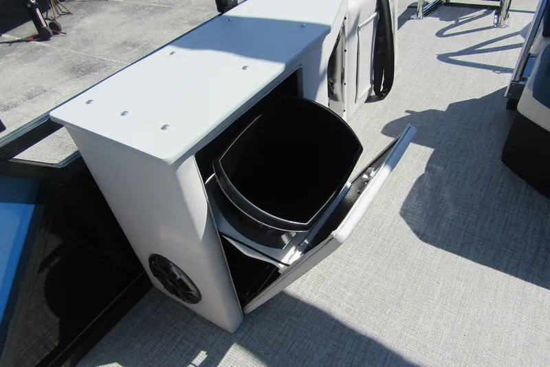 Slide: The Image of 2026 Tahoe Pontoon LTZ Cruise Rear Bench 23 with open storage compartment. - 29