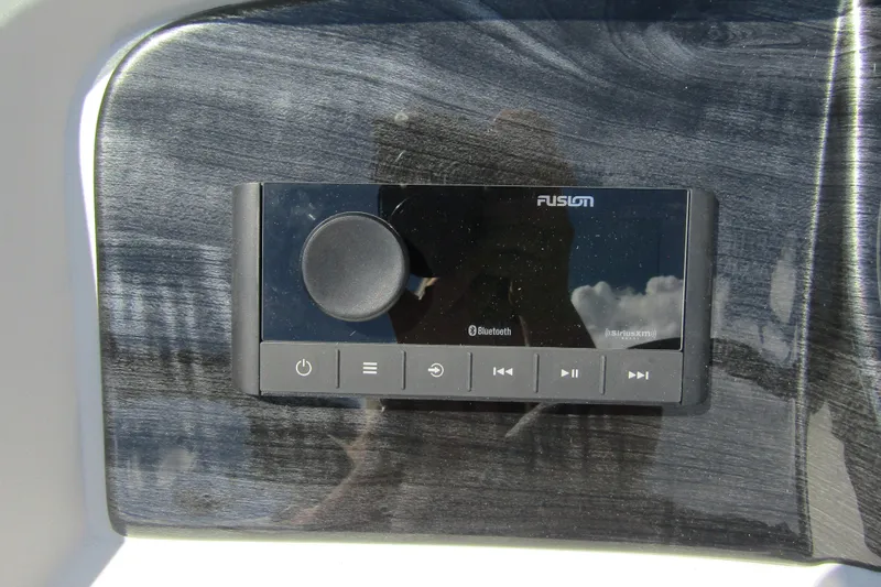 Slide: The Image of Fusion audio system on 2026 Tahoe Pontoon LTZ Cruise Rear Bench 23, featuring Bluetooth connectivity. - 18