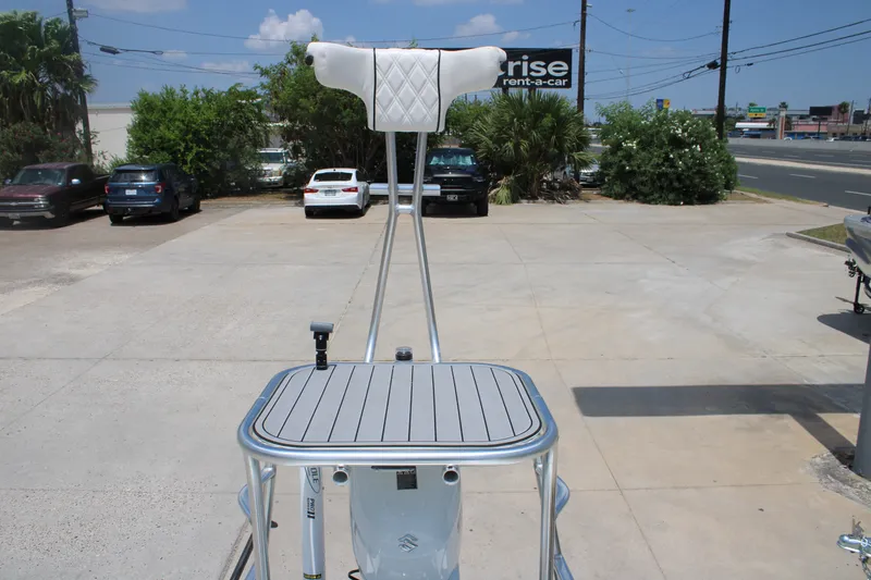 Slide: The Image of 2022 Beavertail Skiffs Mosquito 18' boat platform in a parking lot setting. - 17