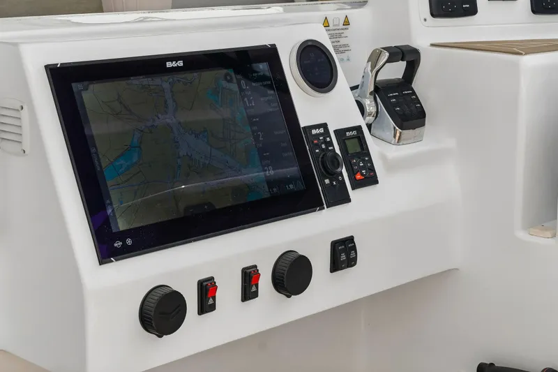 Slide: The Image of Boat control panel with navigation screen and controls, Balance 526, 2025 model. - 50