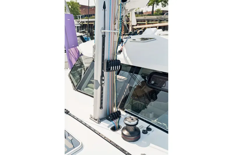 Slide: The Image of Sailboat deck with rigging and winch, Balance 526 model, 2025. - 128