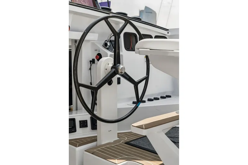 Slide: The Image of Steering wheel of 2025 Balance 526 yacht, showcasing modern design and controls. - 26