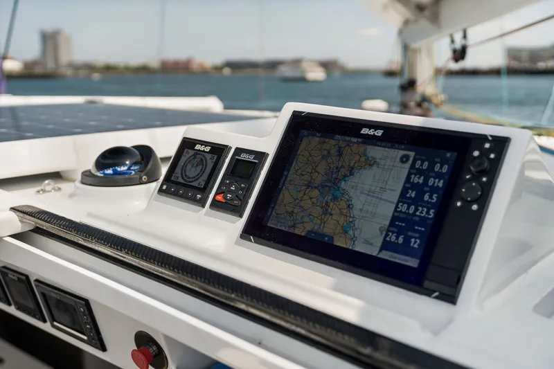 Slide: The Image of Navigation system on Balance 526 yacht, 2025 model, with digital display and compass. - 33