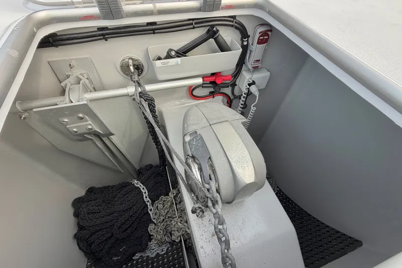 Slide: The Image of Anchor compartment of Balance 526 boat, featuring chains and ropes, 2025 model. - 110