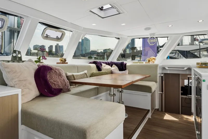 Slide: The Image of Luxurious interior of Balance 526 yacht, featuring plush seating and panoramic windows, 2025 model. - 58