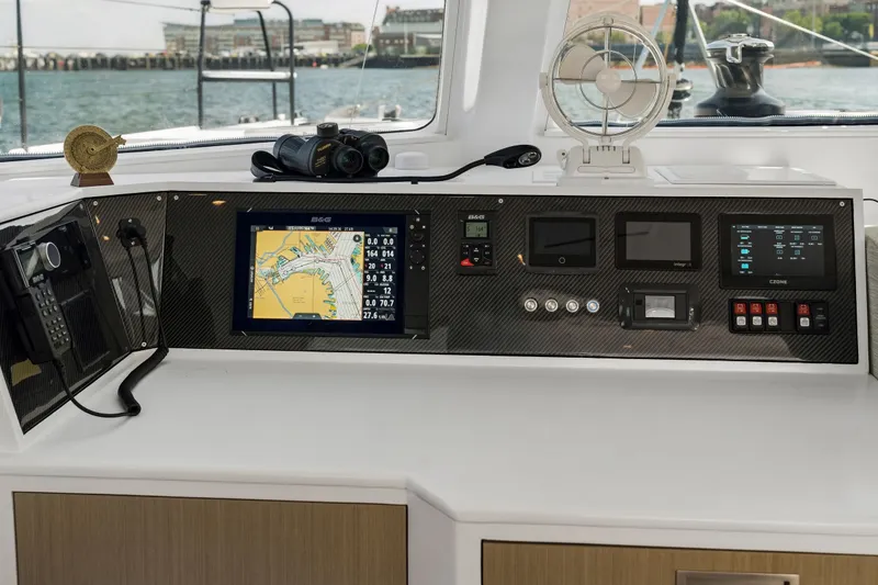 Slide: The Image of Modern navigation console on Balance 526 yacht, featuring advanced controls and displays, 2025 model. - 49