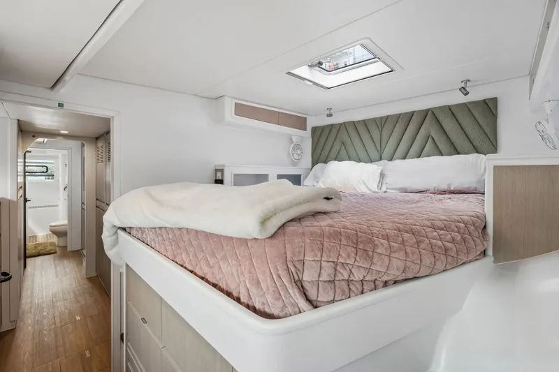 Slide: The Image of Luxurious bedroom in 2025 Balance 526 yacht with skylight and plush bedding. - 73