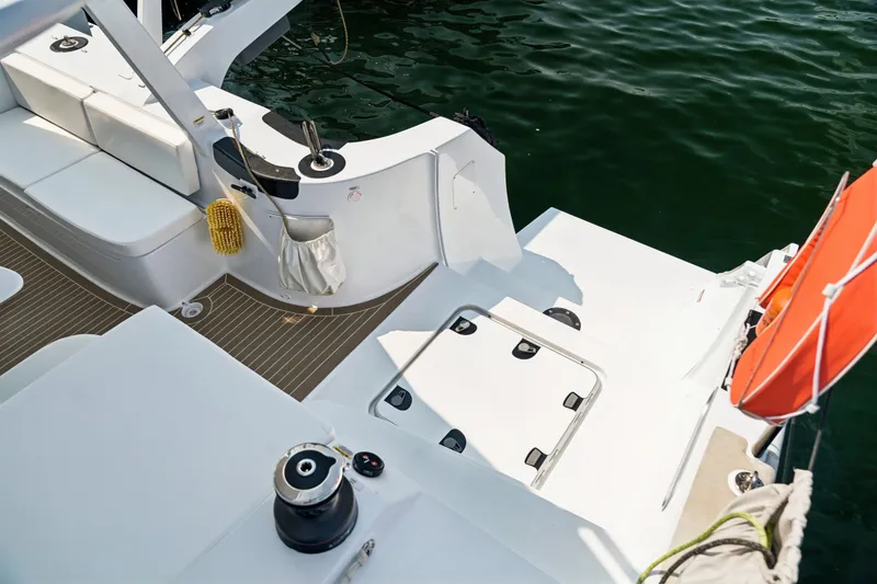 Slide: The Image of Modern Balance 526 yacht deck with seating, winch, and life preserver, 2025 model. - 114