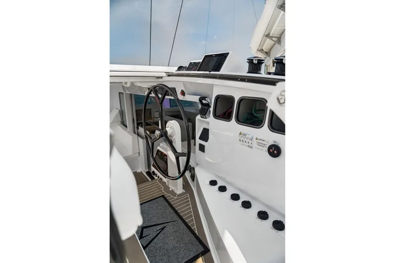 Slide: The Image of Steering wheel and controls of 2025 Balance 526 yacht, showcasing modern design and functionality. - 20