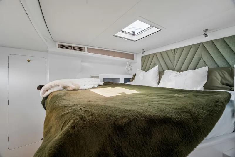 Slide: The Image of Luxurious bedroom interior in 2025 Balance 526 yacht with plush bedding and modern design. - 81