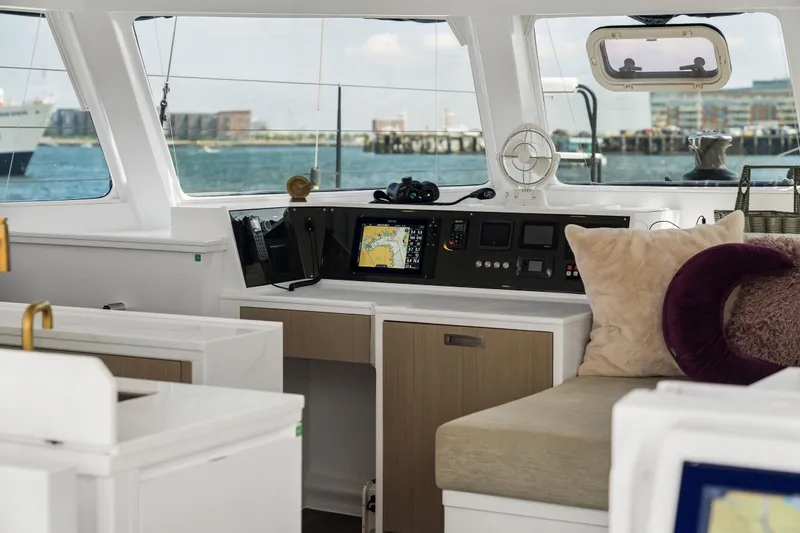 Slide: The Image of Luxurious interior of 2025 Balance 526 yacht with navigation equipment and plush seating. - 61