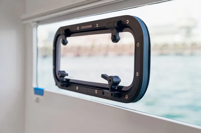 Slide: The Image of Modern Balance 526 window frame, 2025 model, with ocean view background. - 106