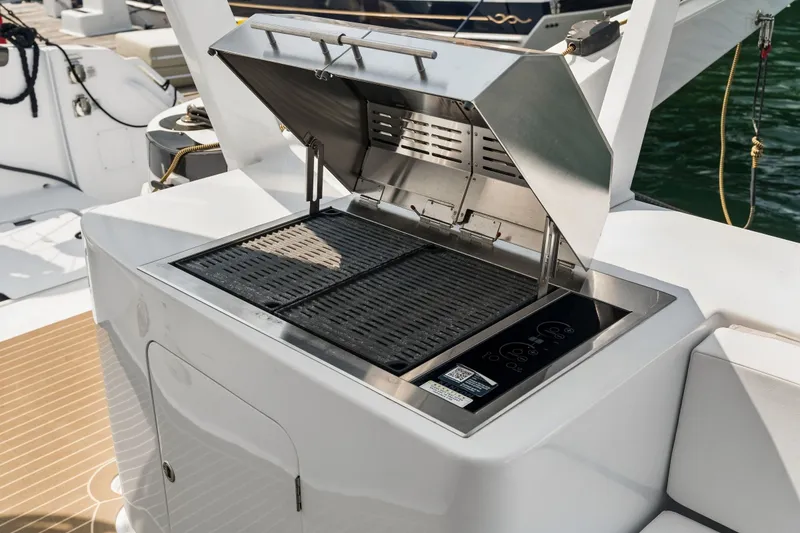 Slide: The Image of Stainless steel grill on Balance 526 yacht, 2025 model, docked at marina. - 25