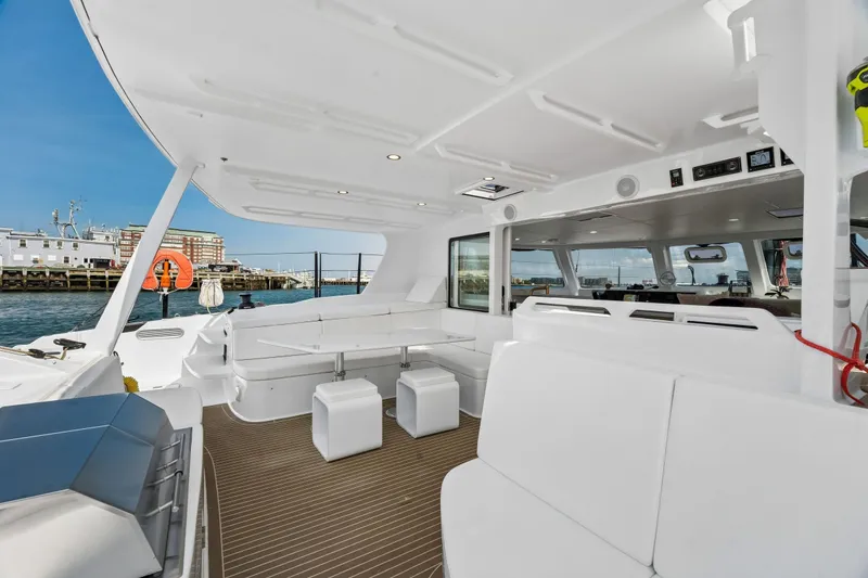 Slide: The Image of Spacious interior of 2025 Balance 526 yacht with modern seating and ocean view. - 35