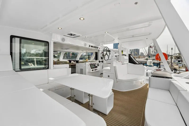 Slide: The Image of Luxurious 2025 Balance 526 yacht interior with sleek white seating and modern design. - 23