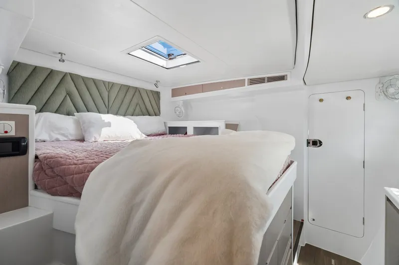Slide: The Image of Luxurious cabin interior of 2025 Balance 526 yacht with plush bedding and modern design. - 70
