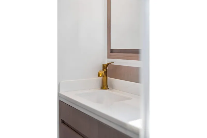Slide: The Image of Modern bathroom sink with gold faucet, Balance 526 model, 2025 design. - 67