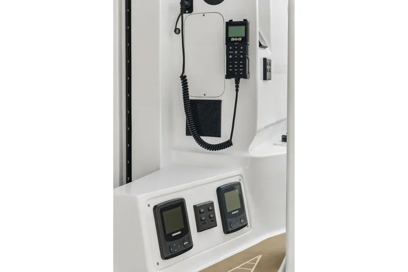 Slide: The Image of Control panel of 2025 Balance 526 yacht featuring navigation and communication equipment. - 54