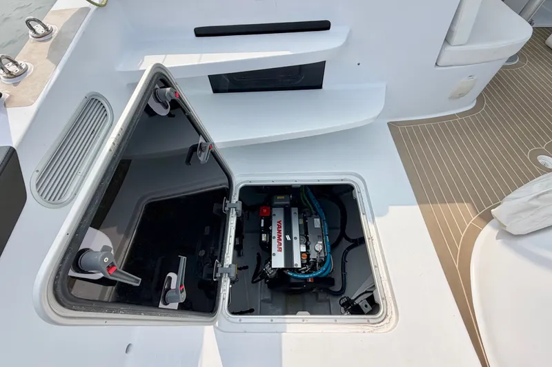 Slide: The Image of Open engine compartment on Balance 526 yacht, showcasing Yanmar engine, 2025 model. - 85