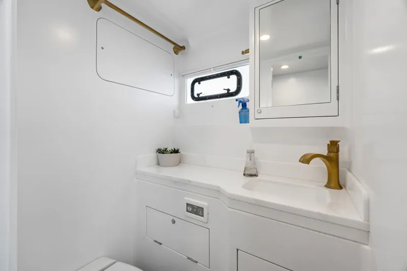 Slide: The Image of Modern bathroom in Balance 526 yacht, featuring sleek design and gold faucet, 2025 model. - 78