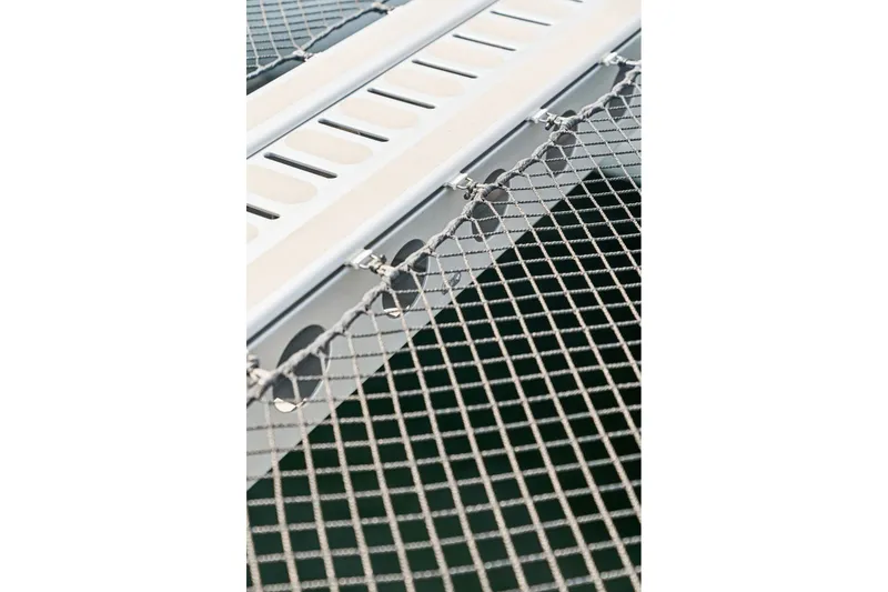 Slide: The Image of Close-up of Balance 526 catamaran netting and deck, 2025 model. - 130