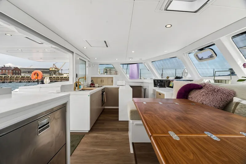 Slide: The Image of Luxurious interior of 2025 Balance 526 yacht with modern kitchen and dining area. - 47