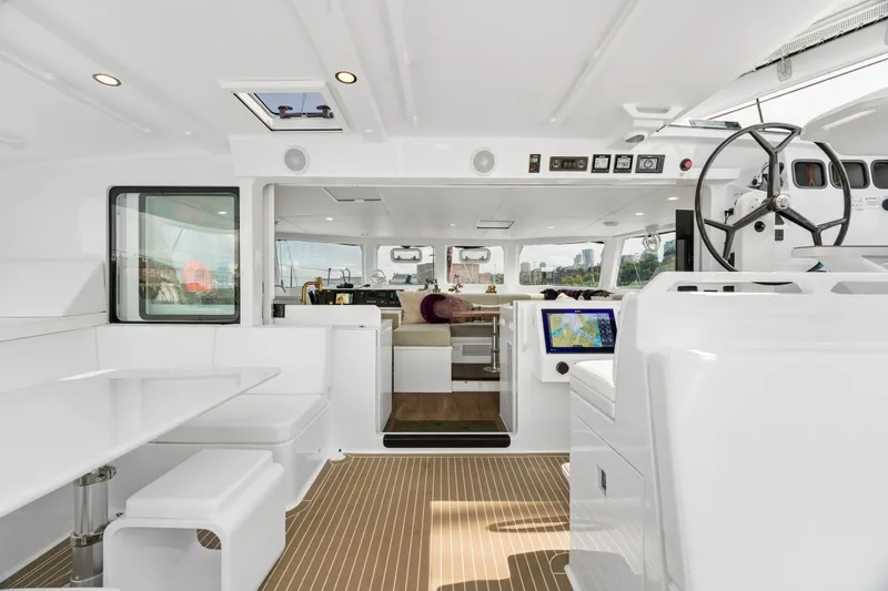 Slide: The Image of Luxurious interior of 2025 Balance 526 yacht with modern navigation equipment and seating area. - 34