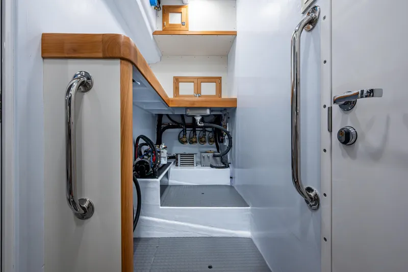 Slide: The Image of Engine room of 2026 Kadey-Krogen 60 Open yacht, featuring sleek design and modern equipment. - 67