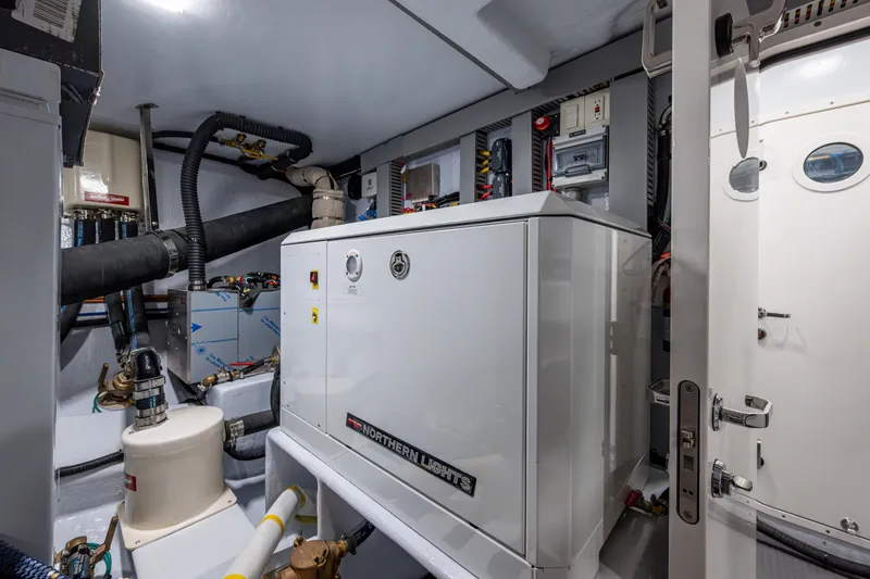 Slide: The Image of Engine room of 2026 Kadey-Krogen 60 Open yacht with generator and equipment. - 70