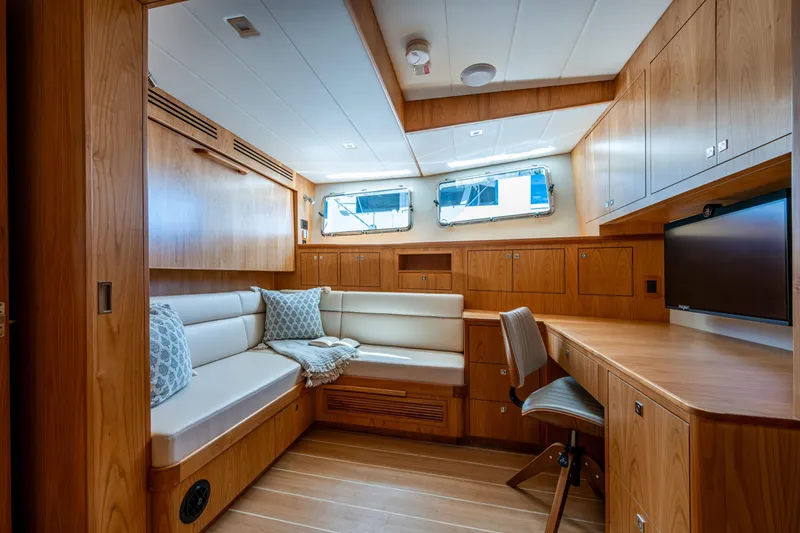Slide: The Image of Luxurious interior of 2026 Kadey-Krogen 60 Open yacht with wood finish and seating area. - 46