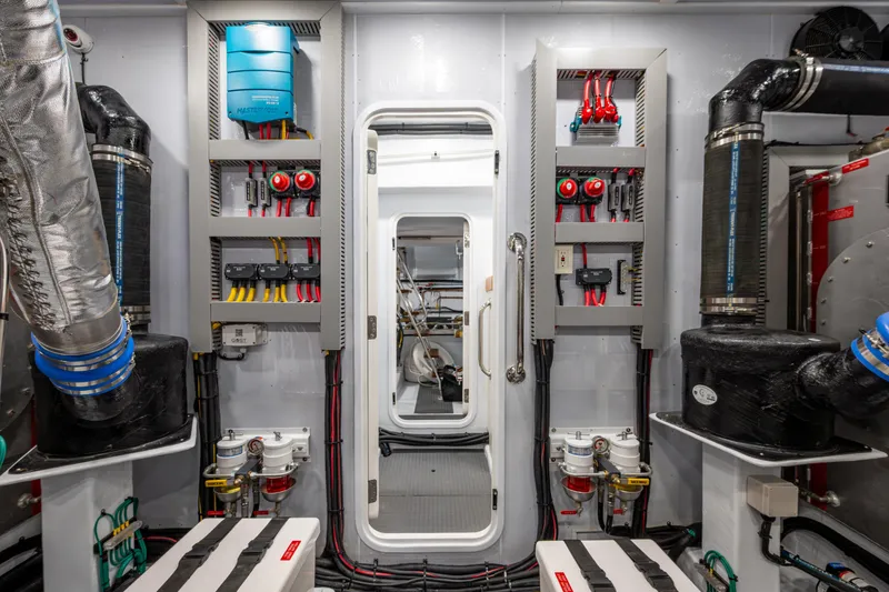 Slide: The Image of Engine room of 2026 Kadey-Krogen 60 Open yacht, featuring advanced electrical systems. - 60