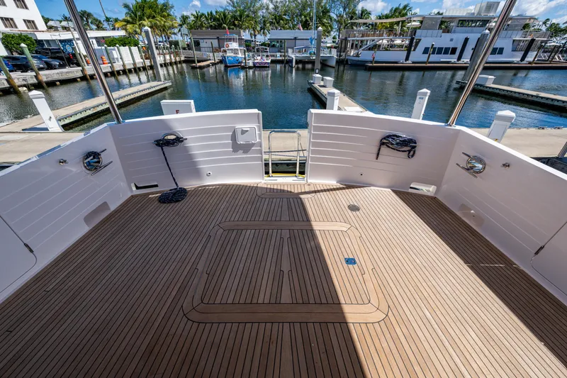 Slide: The Image of Spacious deck of 2026 Kadey-Krogen 60 Open yacht at marina. - 75