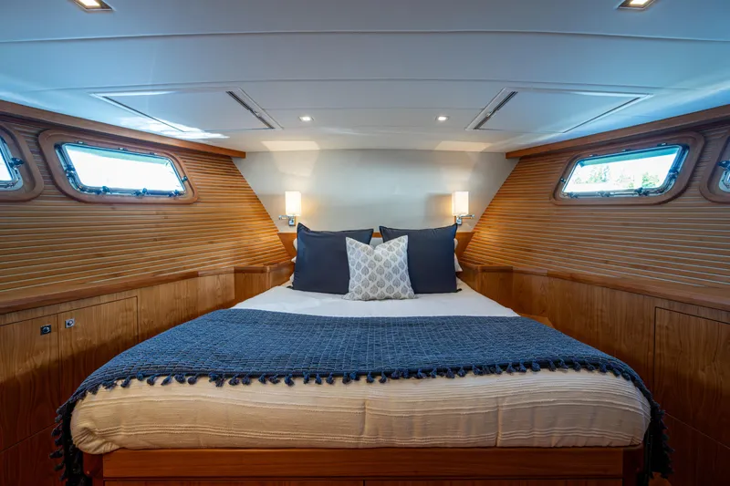 Slide: The Image of Luxurious cabin interior of 2026 Kadey-Krogen 60 Open yacht with cozy bedding. - 37