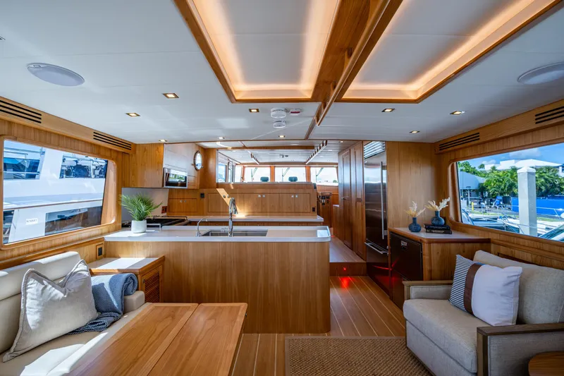 Slide: The Image of Luxurious interior of 2026 Kadey-Krogen 60 Open yacht with modern wood finishes and spacious layout. - 3
