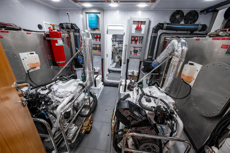 Slide: The Image of Engine room of 2026 Kadey-Krogen 60 Open yacht, featuring advanced machinery and equipment. - 57