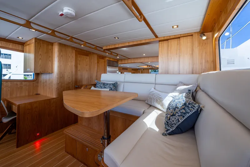 Slide: The Image of Luxurious interior of 2026 Kadey-Krogen 60 Open yacht with elegant wood finish. - 19
