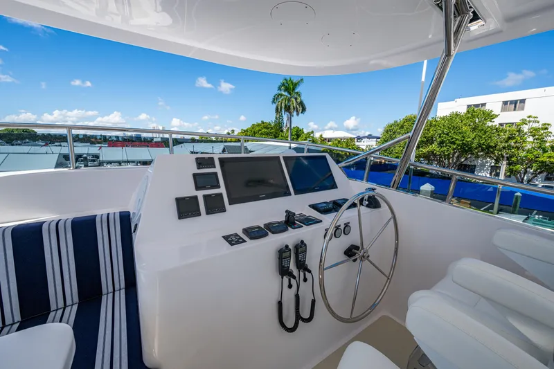 Slide: The Image of Helm of 2026 Kadey-Krogen 60 Open yacht with modern navigation equipment. - 92