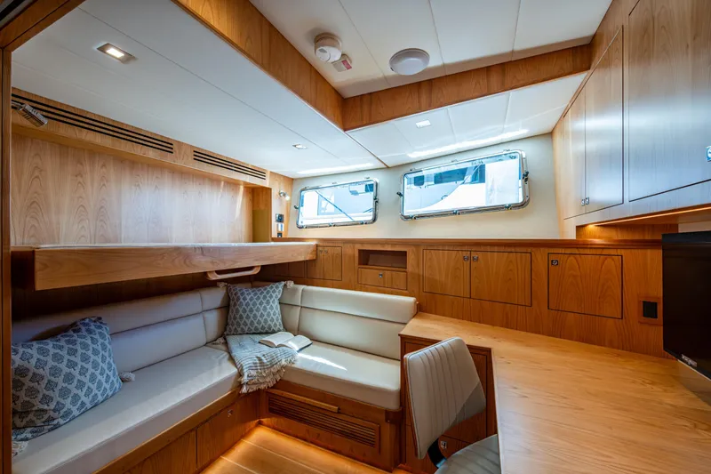 Slide: The Image of Luxurious interior of 2026 Kadey-Krogen 60 Open yacht with cozy seating and elegant wood finishes. - 50