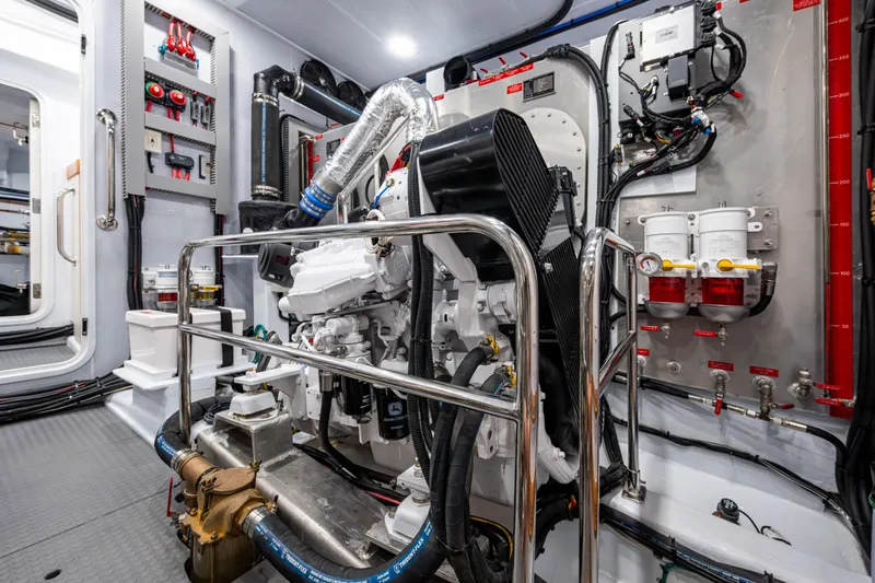 Slide: The Image of Engine room of 2026 Kadey-Krogen 60 Open yacht, showcasing advanced machinery and equipment. - 59