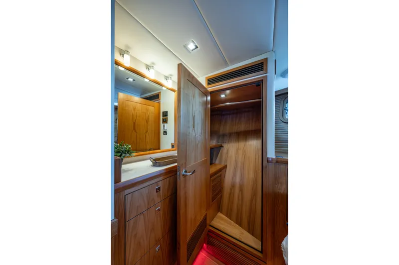 Slide: The Image of Luxurious wooden interior of 2026 Kadey-Krogen 60 Open yacht cabin. - 41