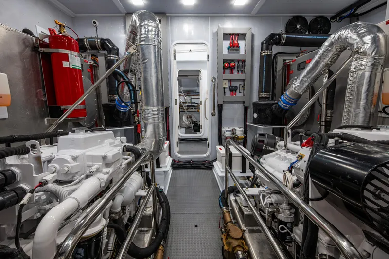 Slide: The Image of Engine room of 2026 Kadey-Krogen 60 Open yacht, featuring advanced machinery and equipment. - 58